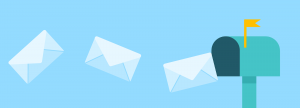 Image of Envelopes flying into mailbox for post what is a postcard in direct mail marketing