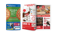 Money Saver Magazine closed beside Money Saver Magazine open showing coupons